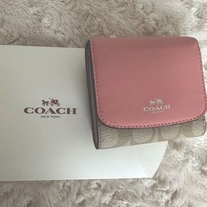 Brand new mini Coach wallet in tan/pink